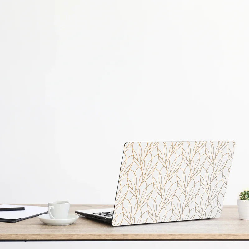 Laptop-Aufkleber goldenes blattmuster auf weißem hintergrund Laptop-Aufkleber goldenes blattmuster auf weißem hintergrund