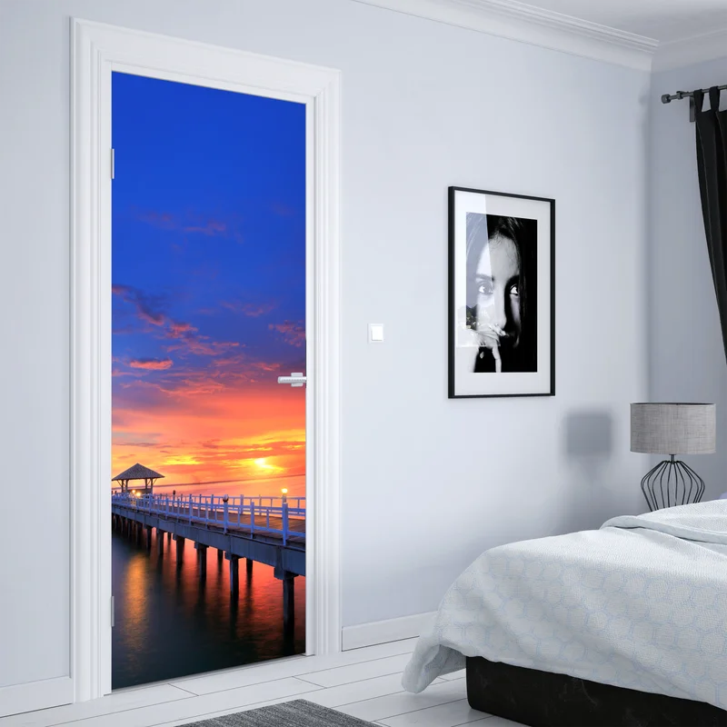 Türaufkleber mole bei sonnenuntergang am strand