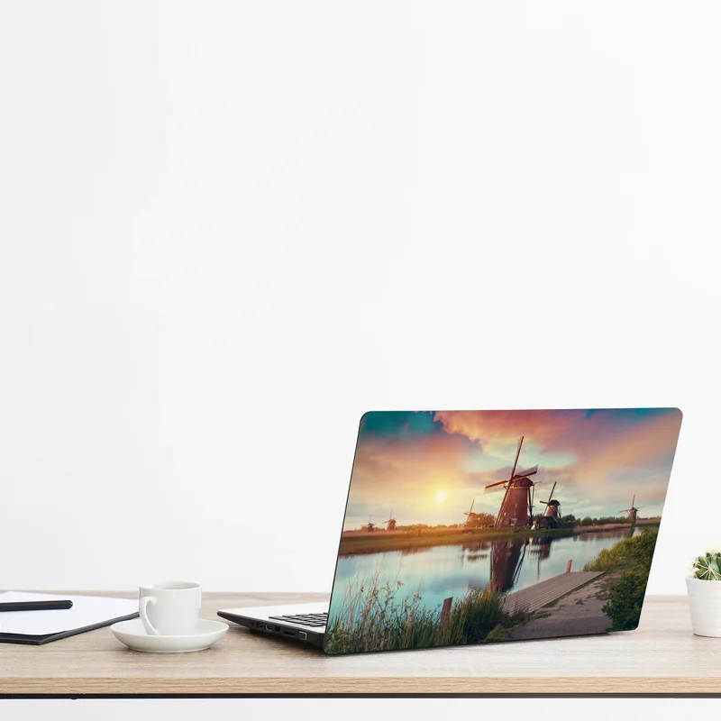 Laptop-Aufkleber sonnenuntergang über windmühlen in den Niederlanden