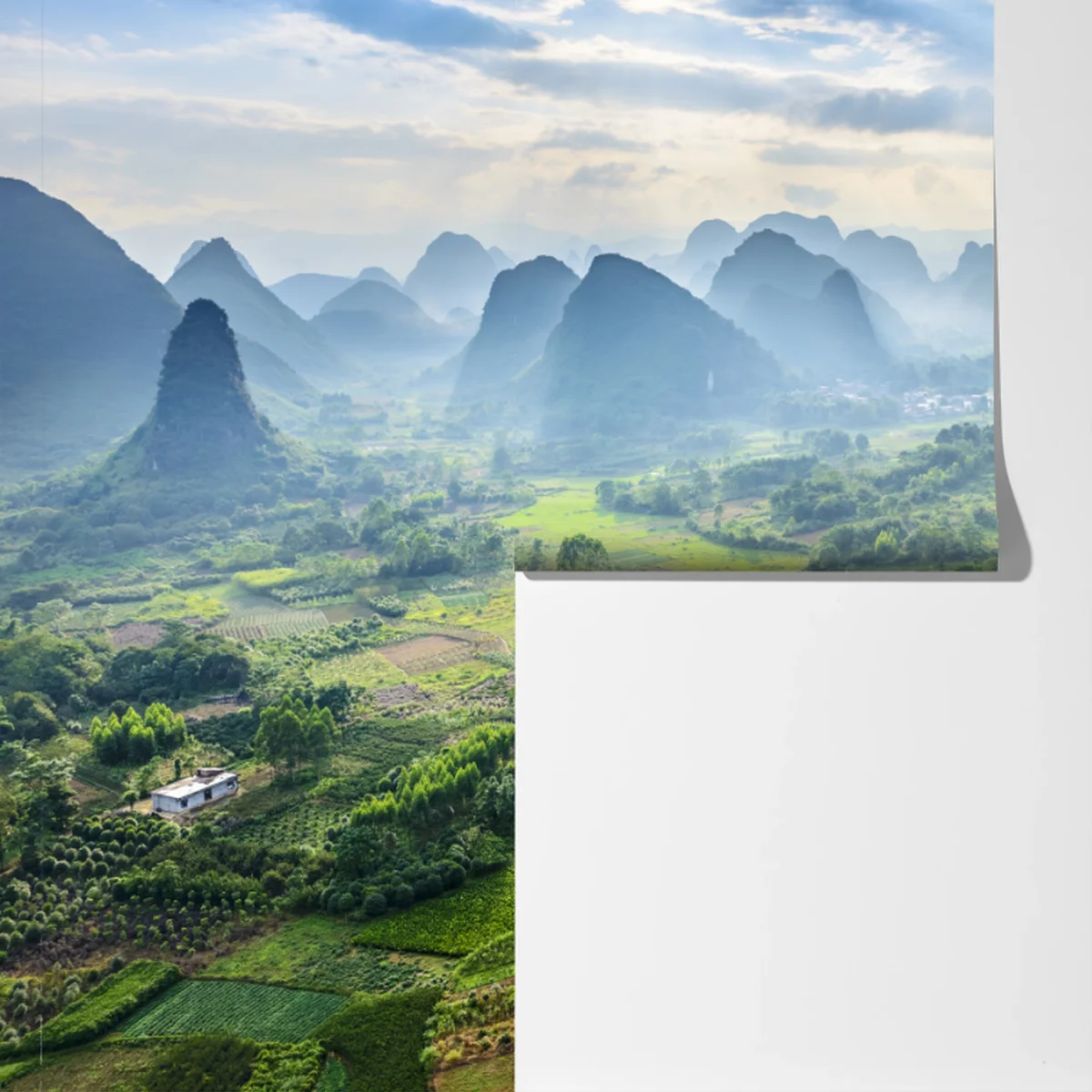 Fototapete nebliges karsttal bei sonnenaufgang Fototapete nebliges karsttal bei sonnenaufgang