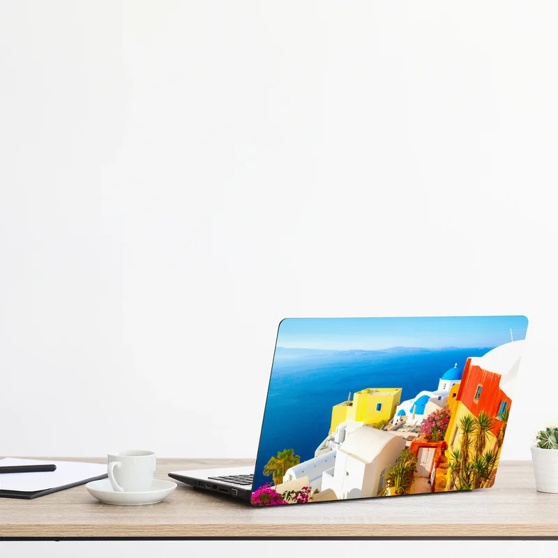 Naklejka na laptopa słoneczna Santorini nadmorska wioska