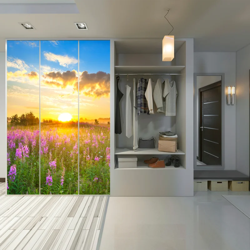 Schrankaufkleber sonnenaufgang über violetter wildblumenwiese