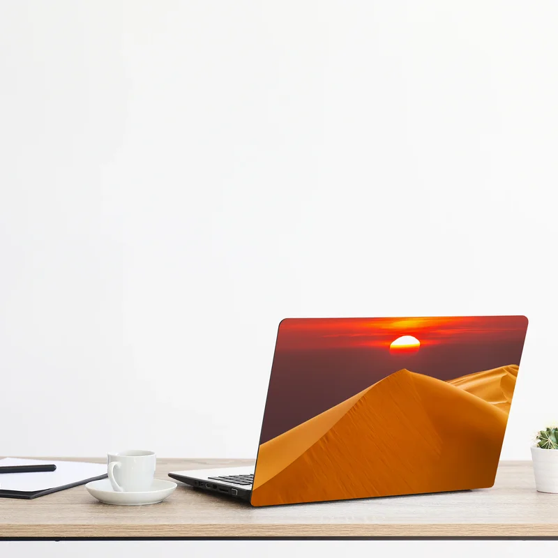 Laptop-Aufkleber goldener sonnenuntergang über sanddünen