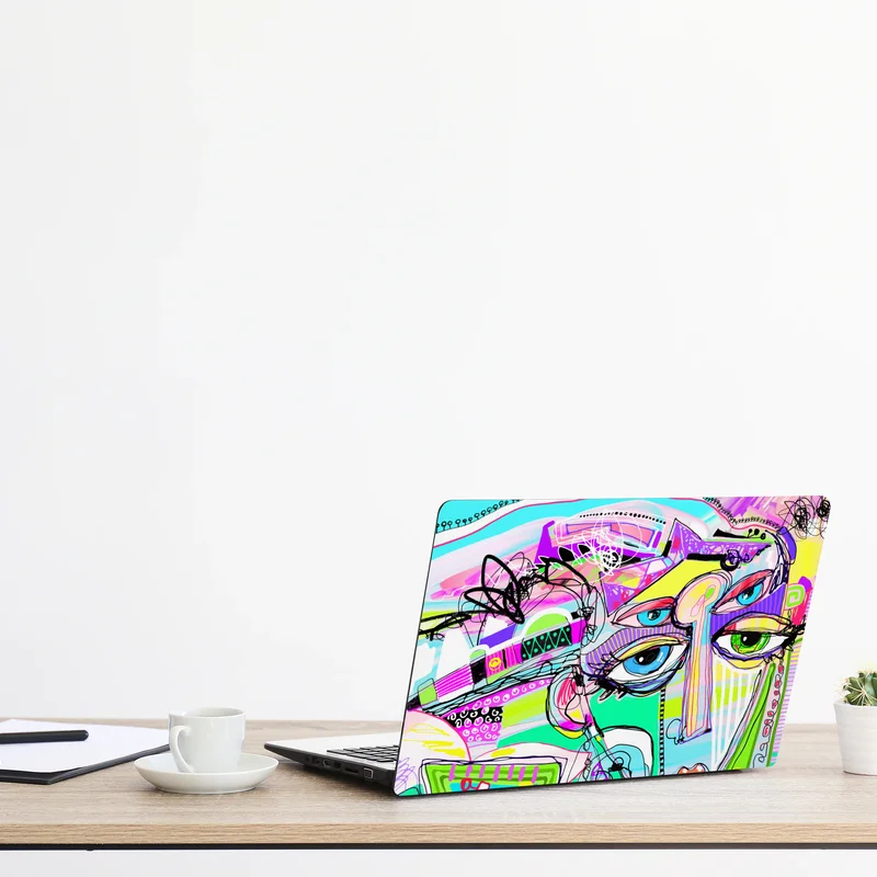 Naklejka na laptopa abstrakcyjna twarz w żywych kolorach