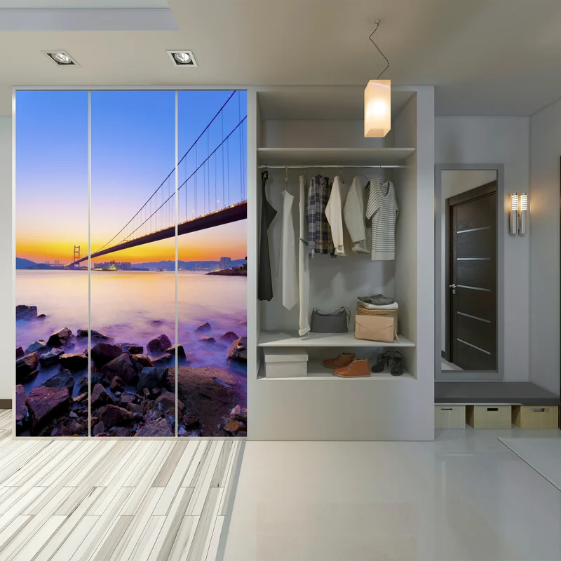 Schrankaufkleber goldener sonnenuntergang über hängebrücke