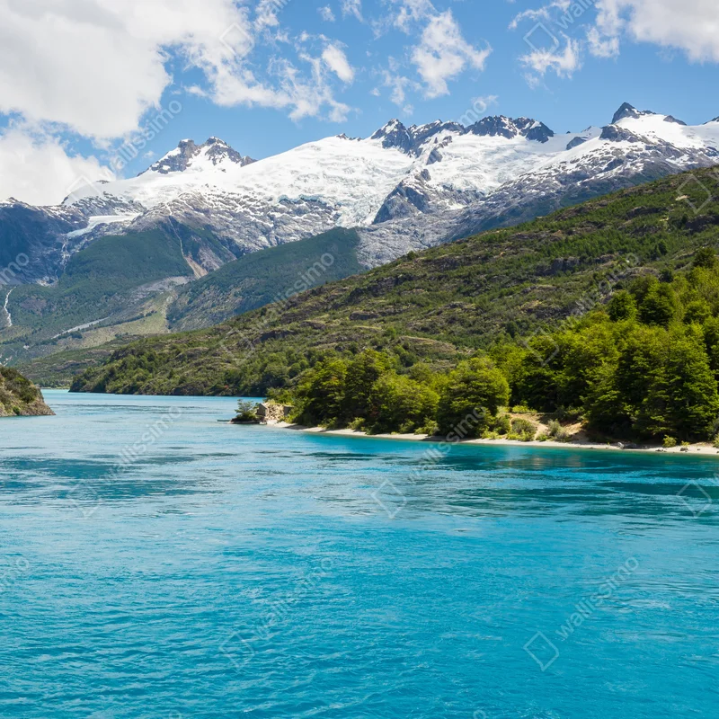 Fototapeta turkusowe jezioro górskie z ośnieżonymi szczytami Fototapeta turkusowe jezioro górskie z ośnieżonymi szczytami