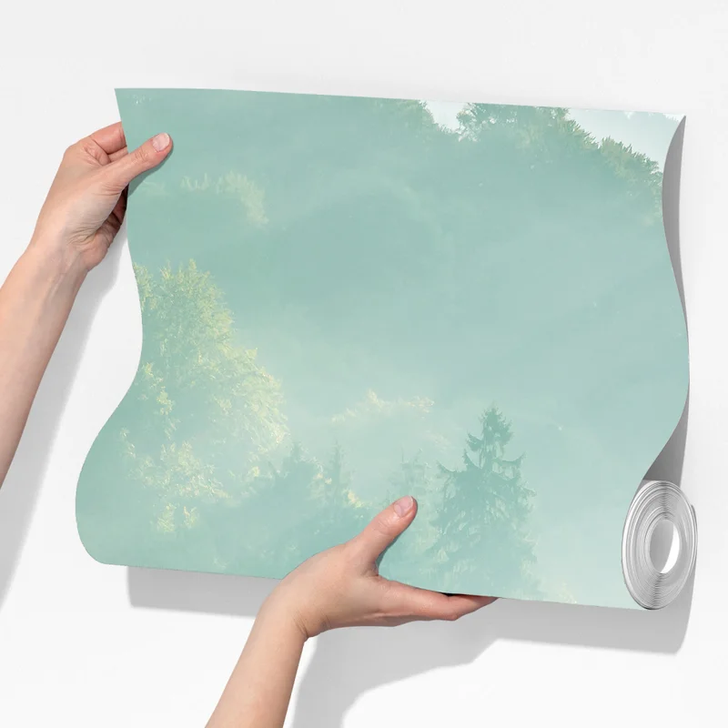 Fototapete neblige fichtenspitzen im morgenlicht Fototapete neblige fichtenspitzen im morgenlicht