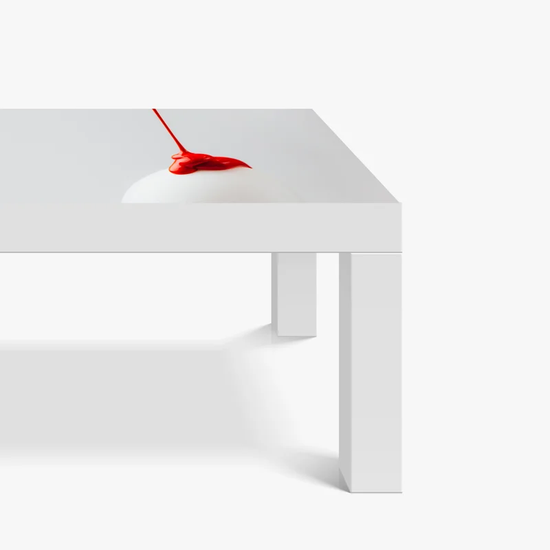 Tischaufkleber und Schreibtischaufkleber rote farbtröpfchen auf weißem ei