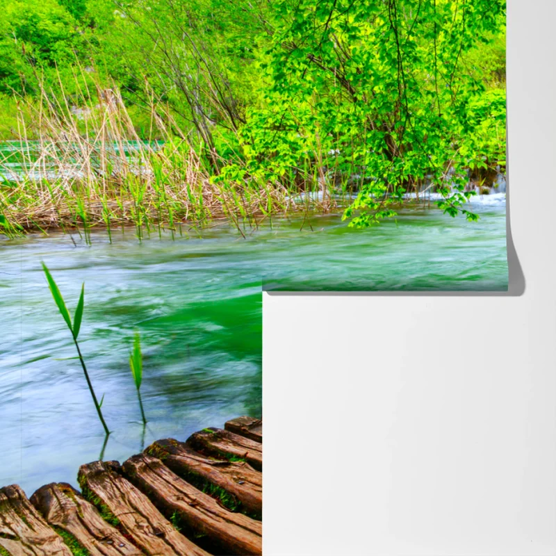 Fototapeta spokojna zielona kładka nad rzeką Fototapeta spokojna zielona kładka nad rzeką