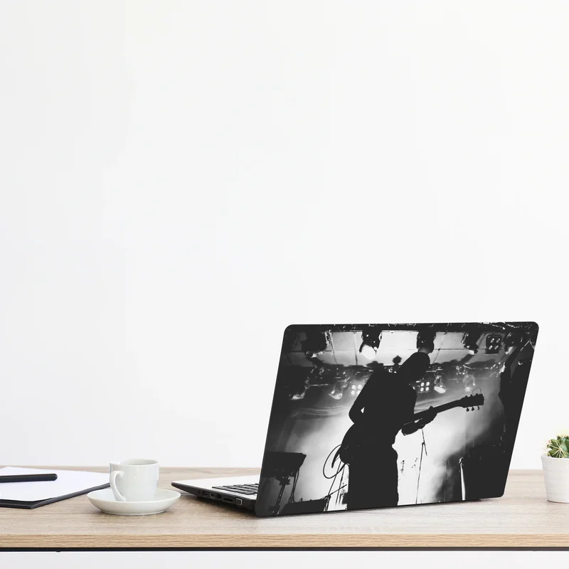 Laptop-Aufkleber gitaristensilhouette bei einem live-konzert Laptop-Aufkleber gitaristensilhouette bei einem live-konzert