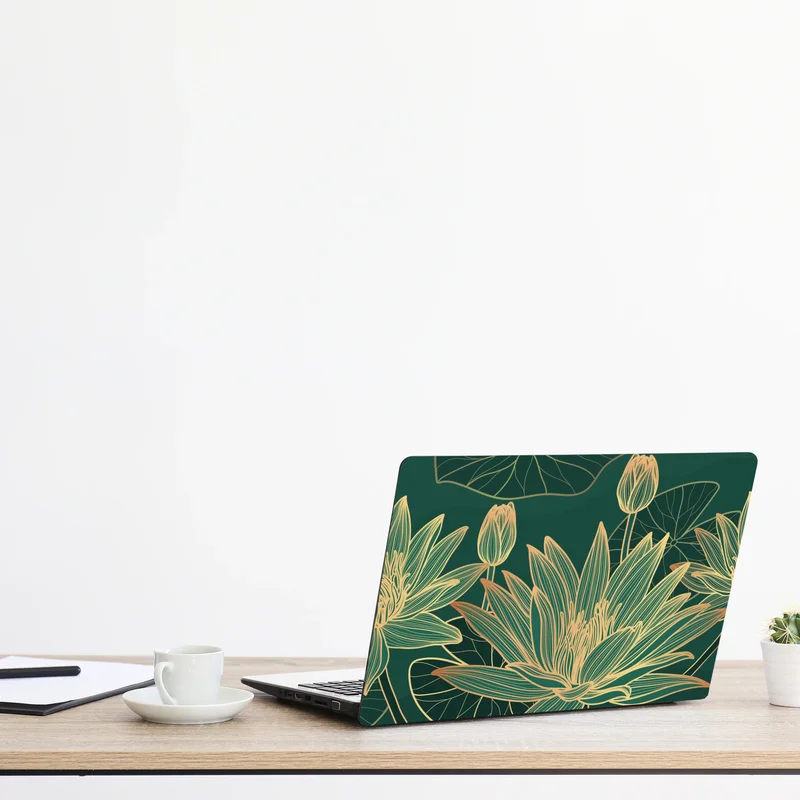 Laptop-Aufkleber goldene lotosblüten auf grünem hintergrund