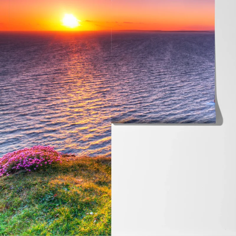 Fototapete sonnenuntergang über zerklüfteten küstenklippen Fototapete sonnenuntergang über zerklüfteten küstenklippen