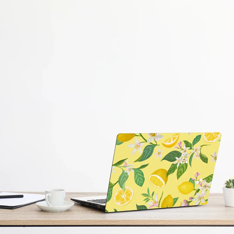 Naklejka na laptopa wzór z kwiatami i cytrynami