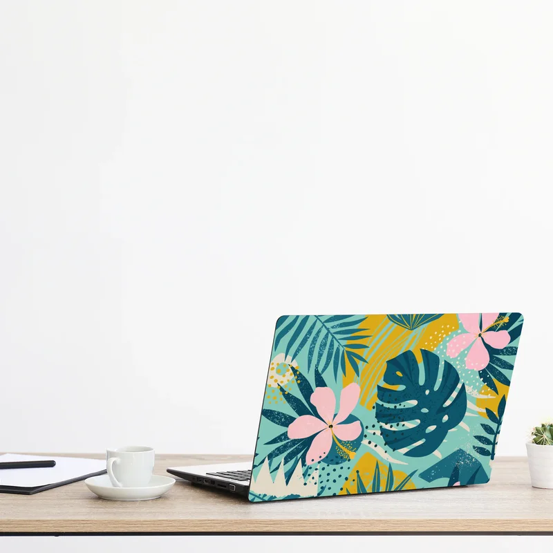 Naklejka na laptopa tropikalne liście i kwiaty Naklejka na laptopa tropikalne liście i kwiaty