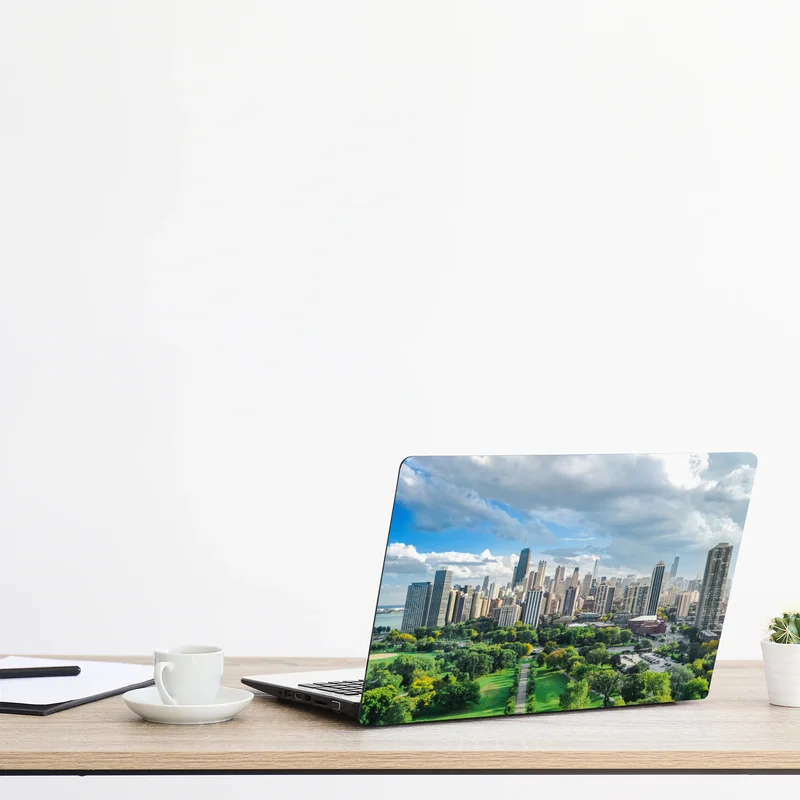 Laptop-Aufkleber stadtpanorama über grünem park