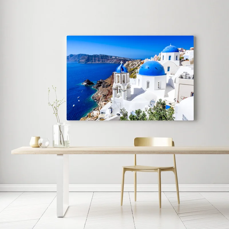 Leinwandbild Santorini blaue kuppeln über der kaldera Leinwandbild Santorini blaue kuppeln über der kaldera