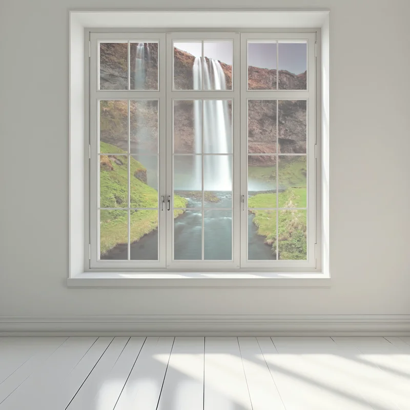 Naklejka na okno mglisty wodospad w bujnej dolinie